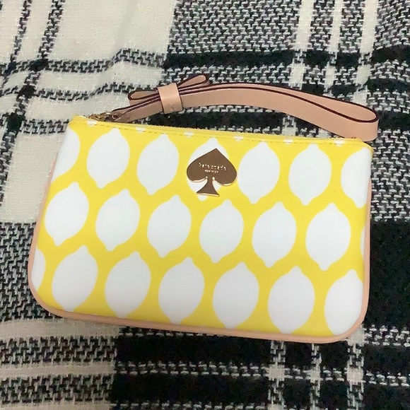 kate spade Handbags - Kate spade yellow lemon print wristlet wallet